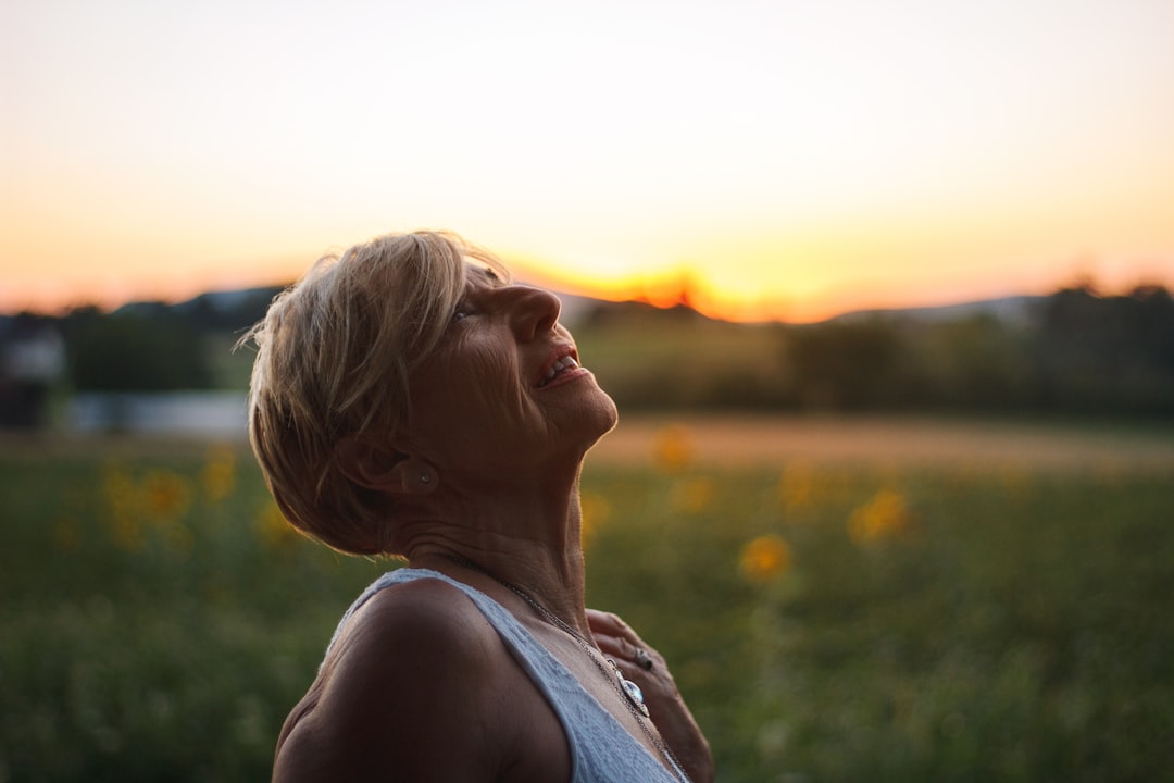 A woman looking thoughtful and composed, representing bladder health challenges