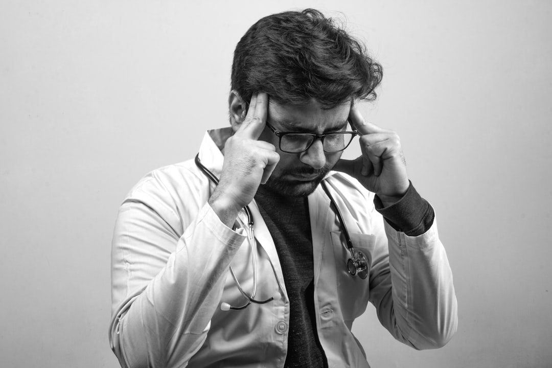 A middle-aged man with a contemplative expression, reflecting emotional and intimacy concerns