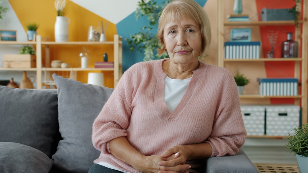 A woman looking thoughtful and composed, representing bladder health challenges