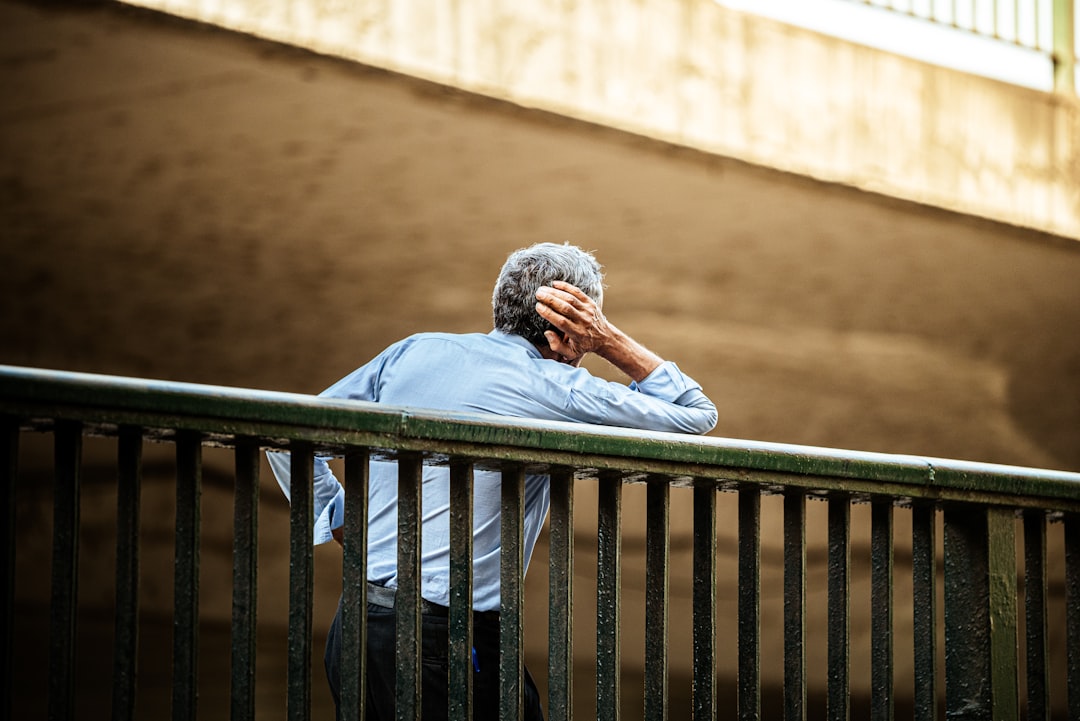 A middle-aged man with a contemplative expression, reflecting emotional and intimacy concerns