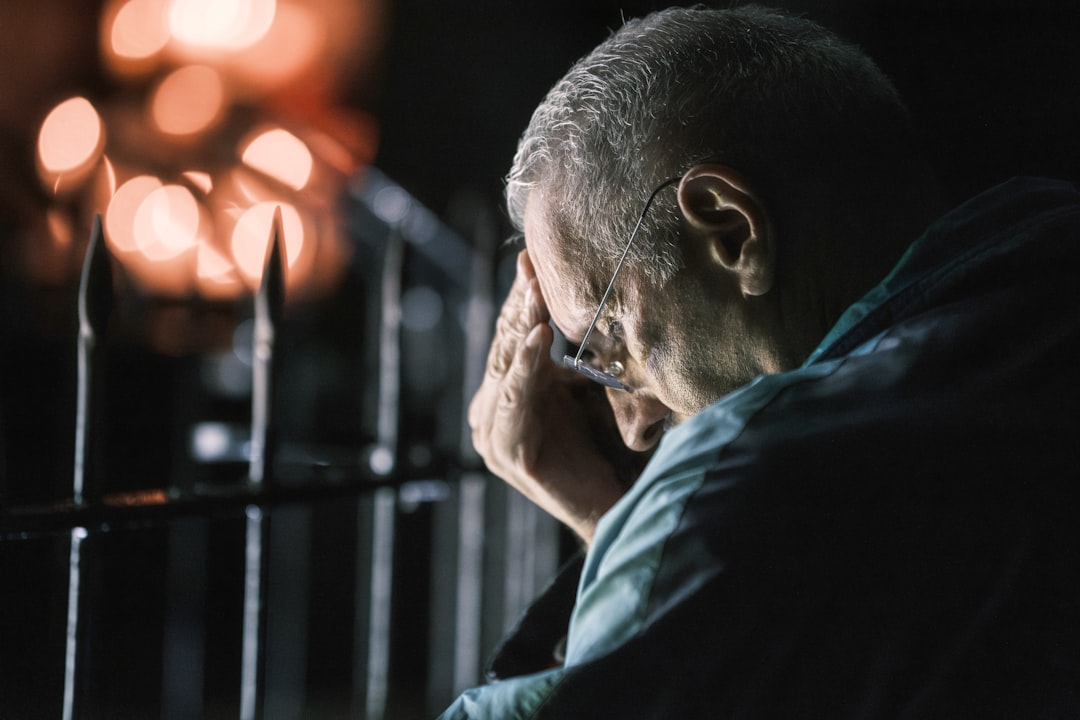 A middle-aged man with a contemplative expression, reflecting emotional and intimacy concerns