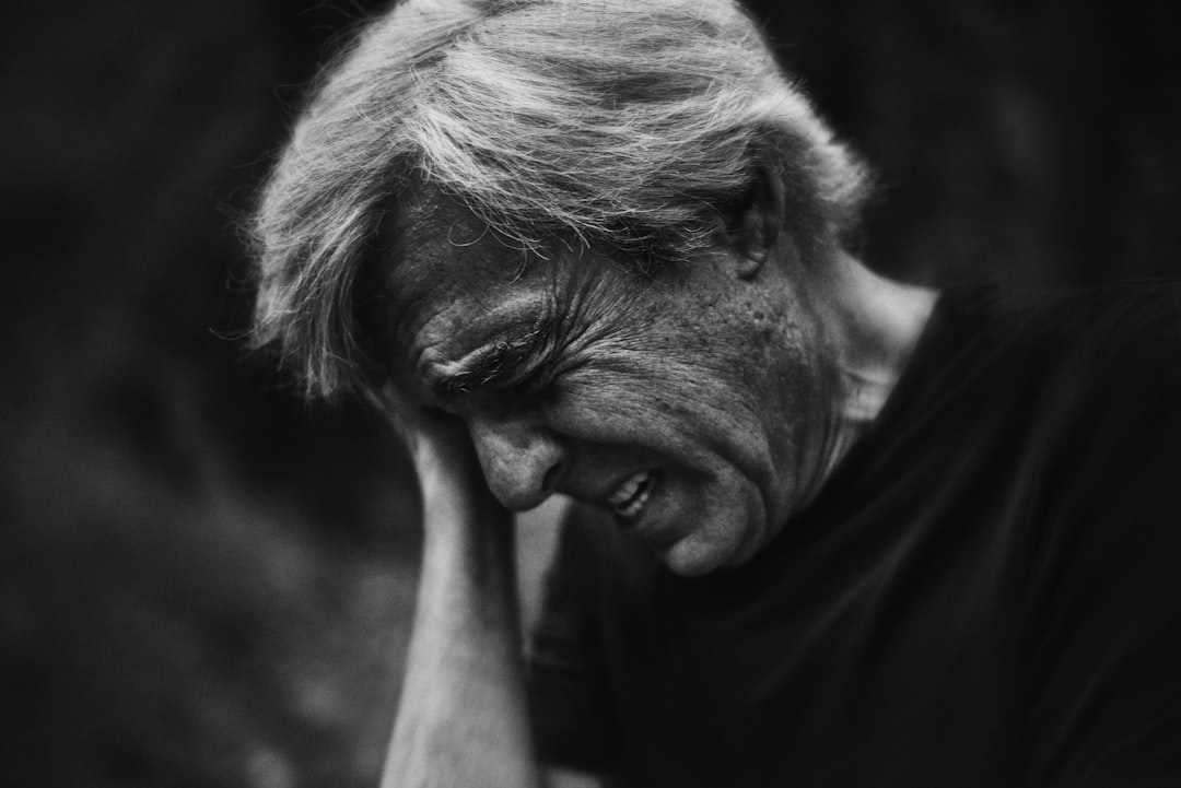 A middle-aged man with a contemplative expression, reflecting emotional and intimacy concerns