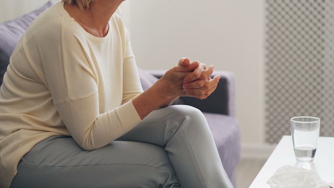 A woman looking thoughtful and composed, representing bladder health challenges